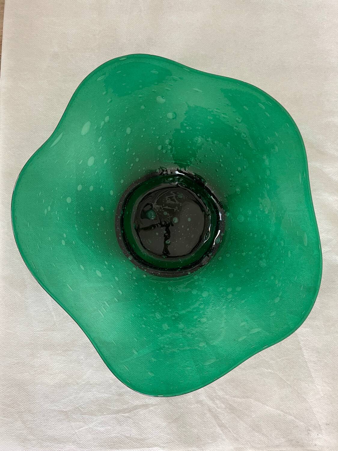 Green glass dish by Max Verboeket