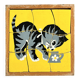 Wooden frame puzzle from the 1940s/50s depicting a cat on a yellow background.