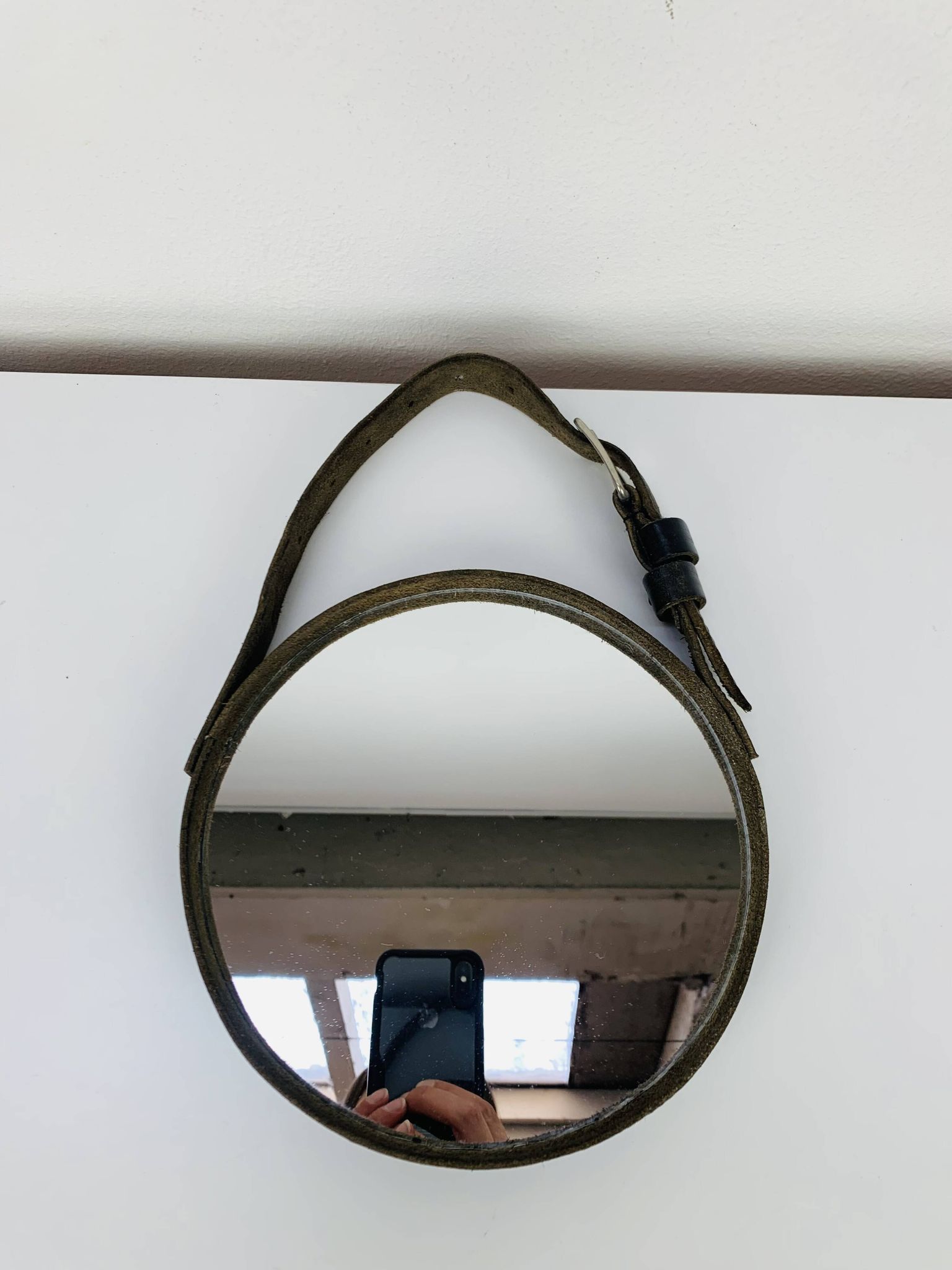 Mirror with handmade leather strapping