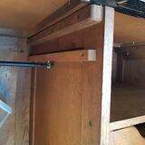 Old black wardrobe - wooden drawers and labels of origin
