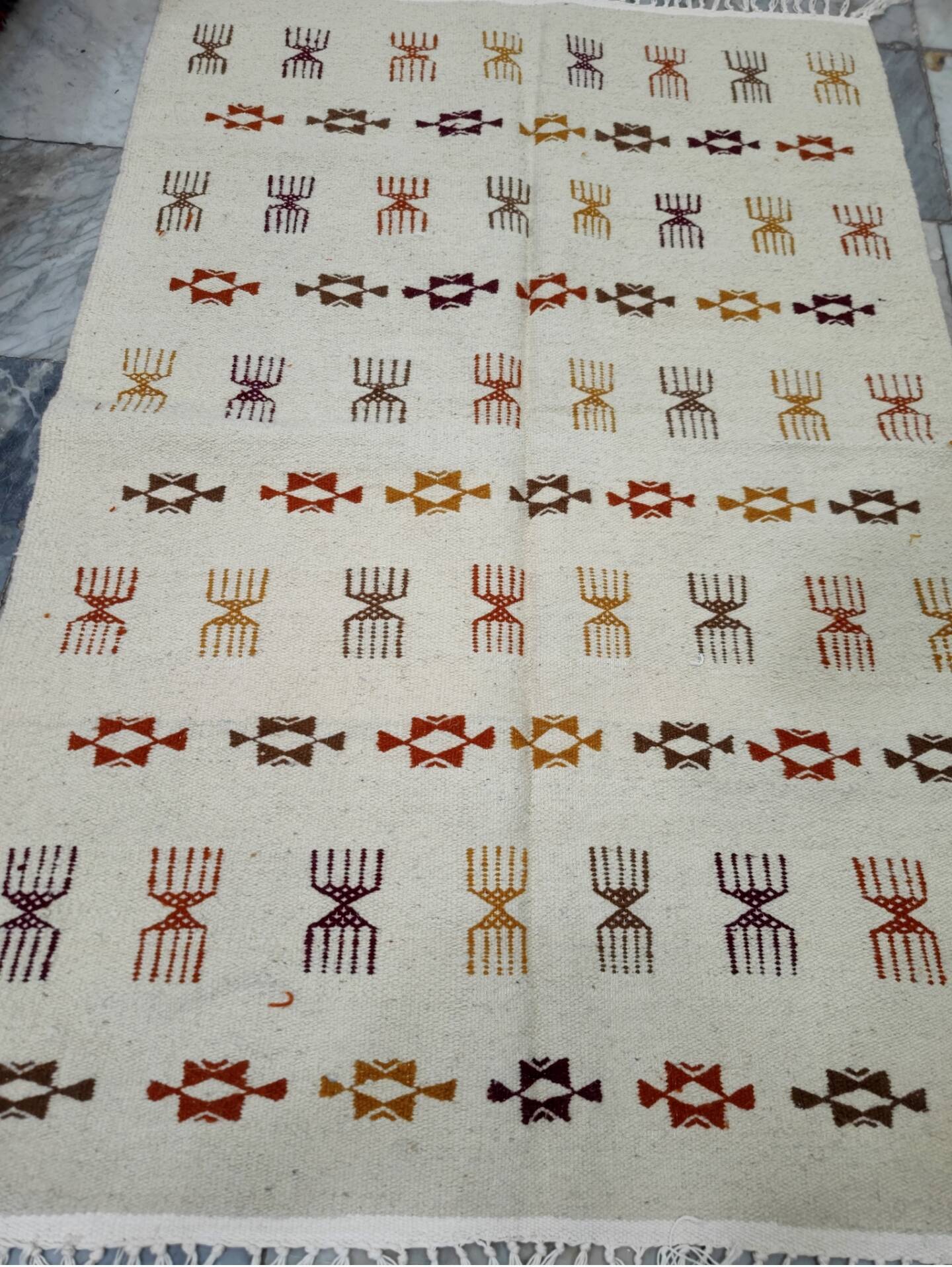 Handmade Berber patterned rug in natural wool