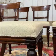 Set of 2 armchairs and 6 English mahogany chairs from the 1950s.