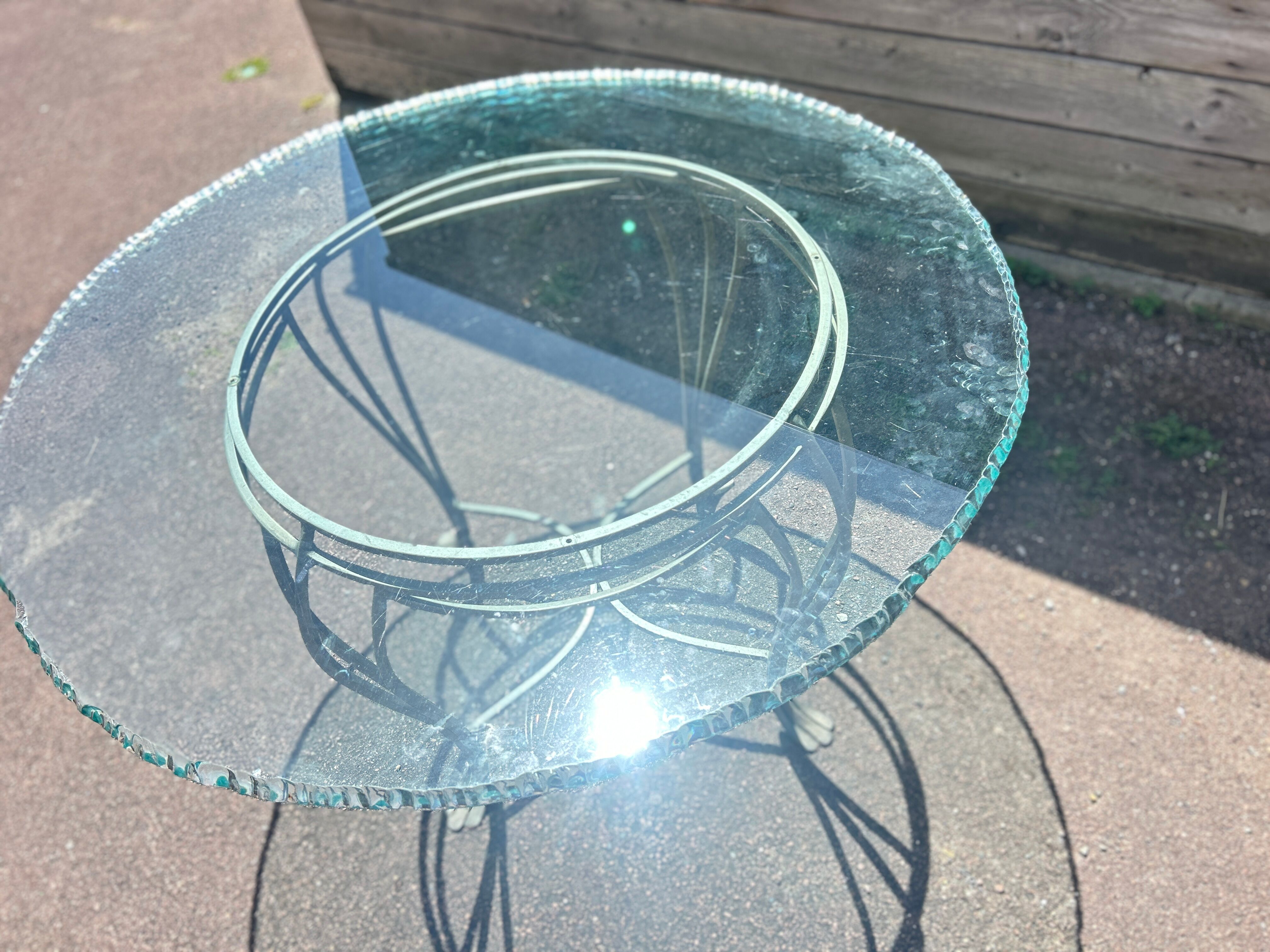 Table ronde en verre et fer forgé