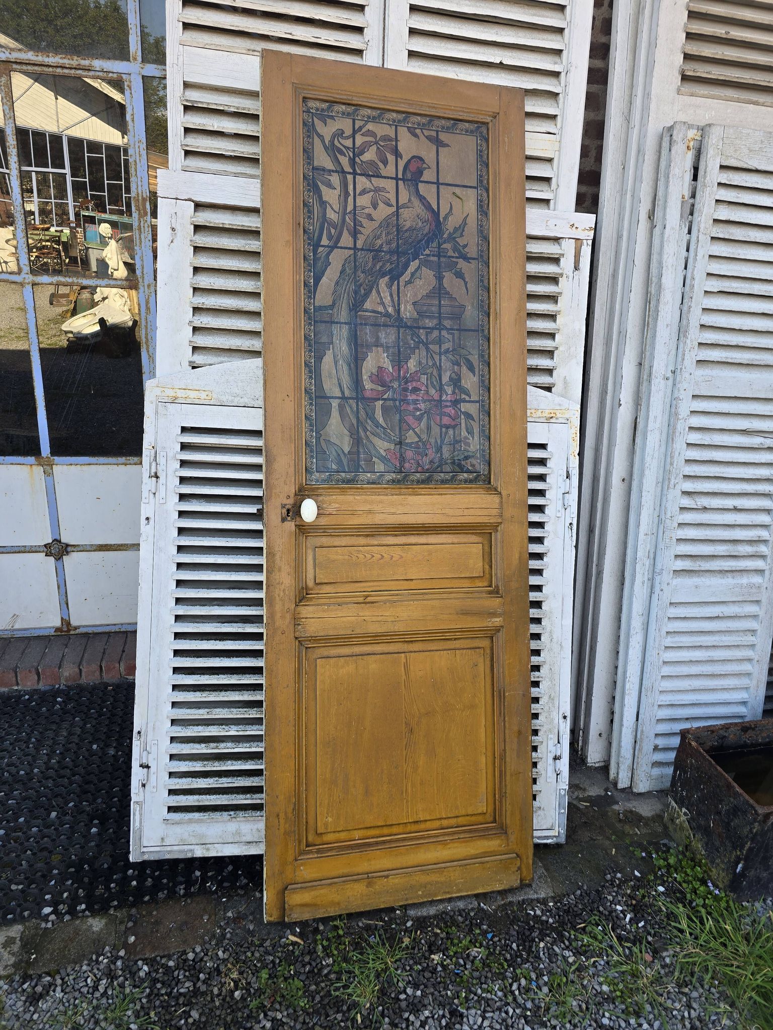 old door with decorated window