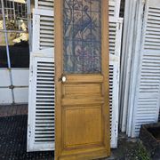 old door with decorated window