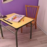 Old school desk in yellow formica