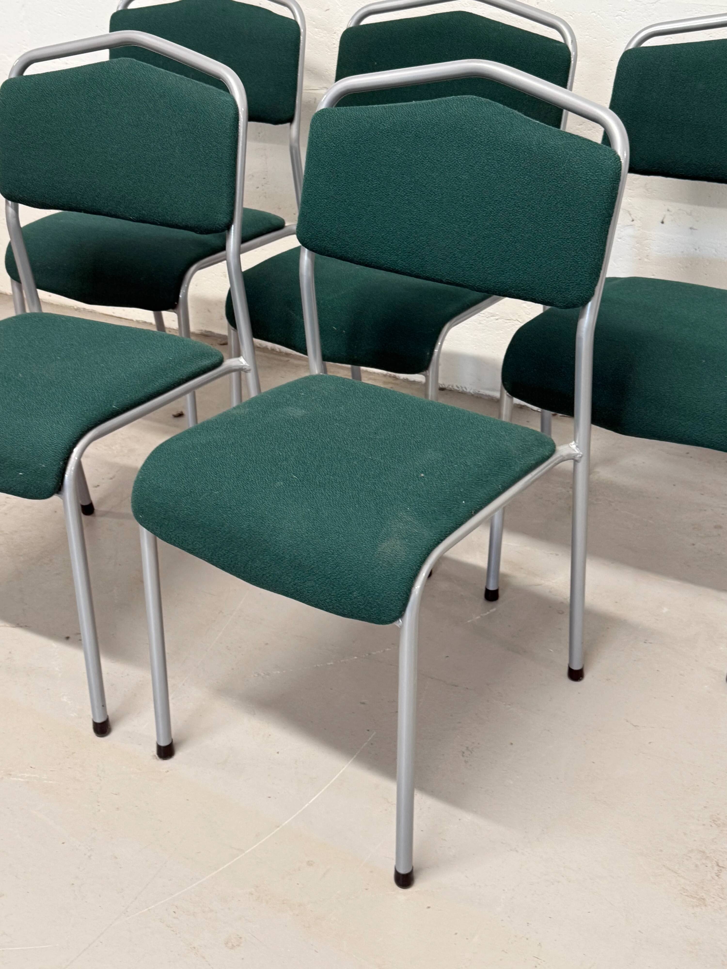 Set of 5 green padded vintage stackable chairs.