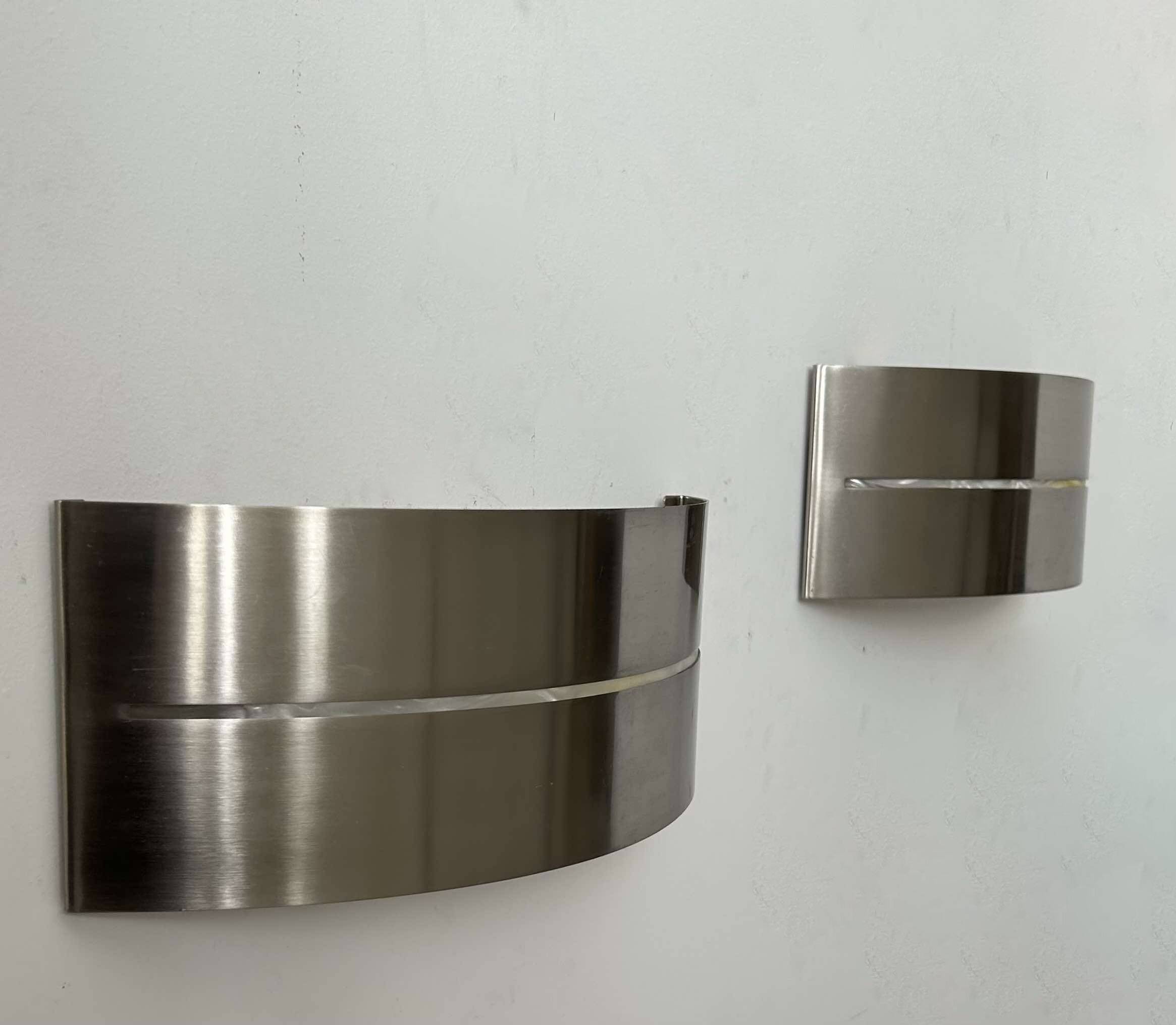 Pair of vintage wall lights, brushed metal, France 1980.