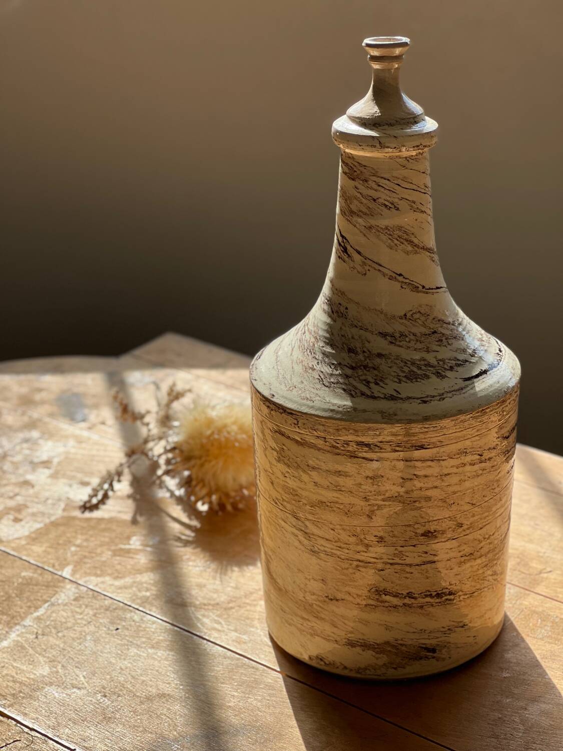 Large handcrafted bottle in glazed and marbled ceramic stoneware