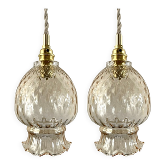 Set of two vintage golden glass handhelds