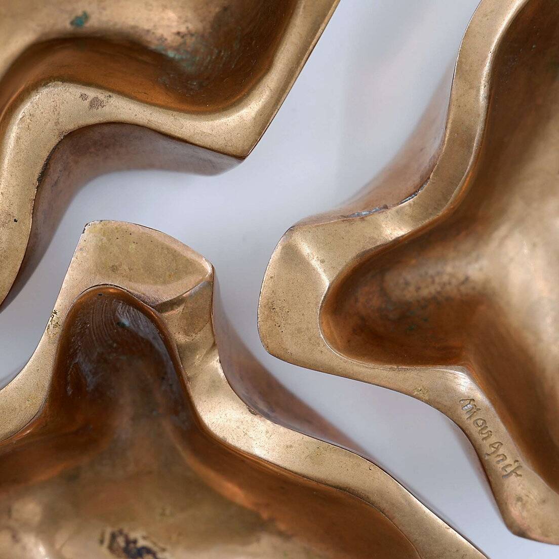 Empty Pockets in polished bronze Margrit van Nuffel 1970, set of 3