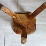 Brutalist stool made of olive wood