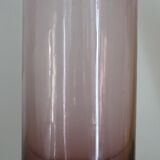 Plum-colored glass bottle with bubble