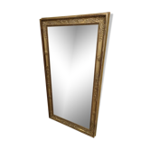 Miroir époque Restauration doré en bois et stuc, 119x63 cm