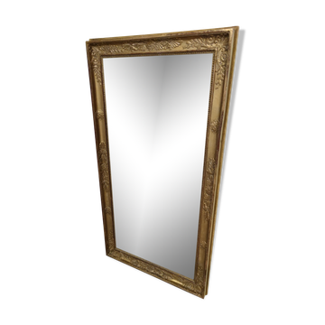 Miroir époque Restauration doré en bois et stuc, 119x63 cm
