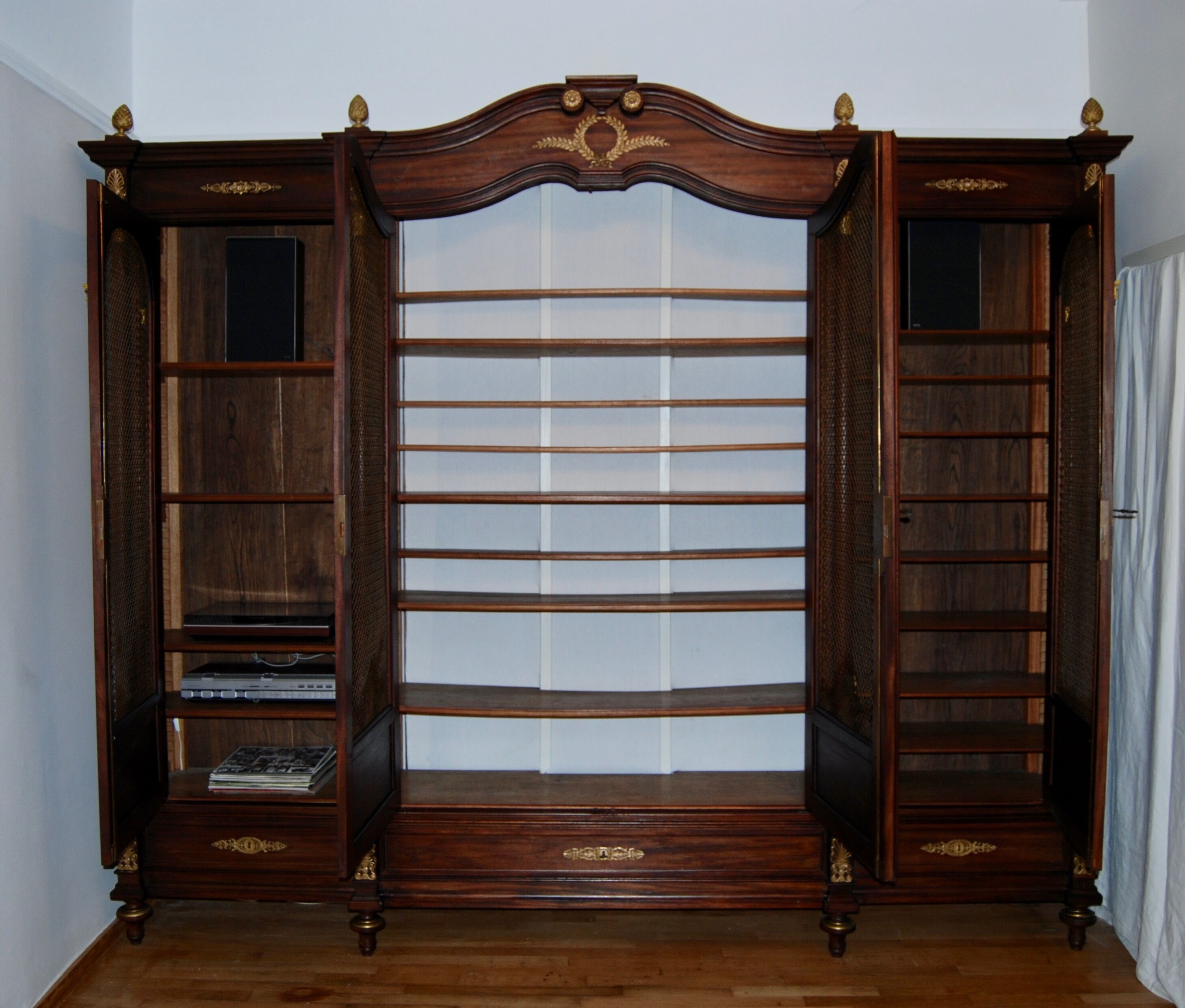 Large Empire library in solid mahogany, late nineteenth century
