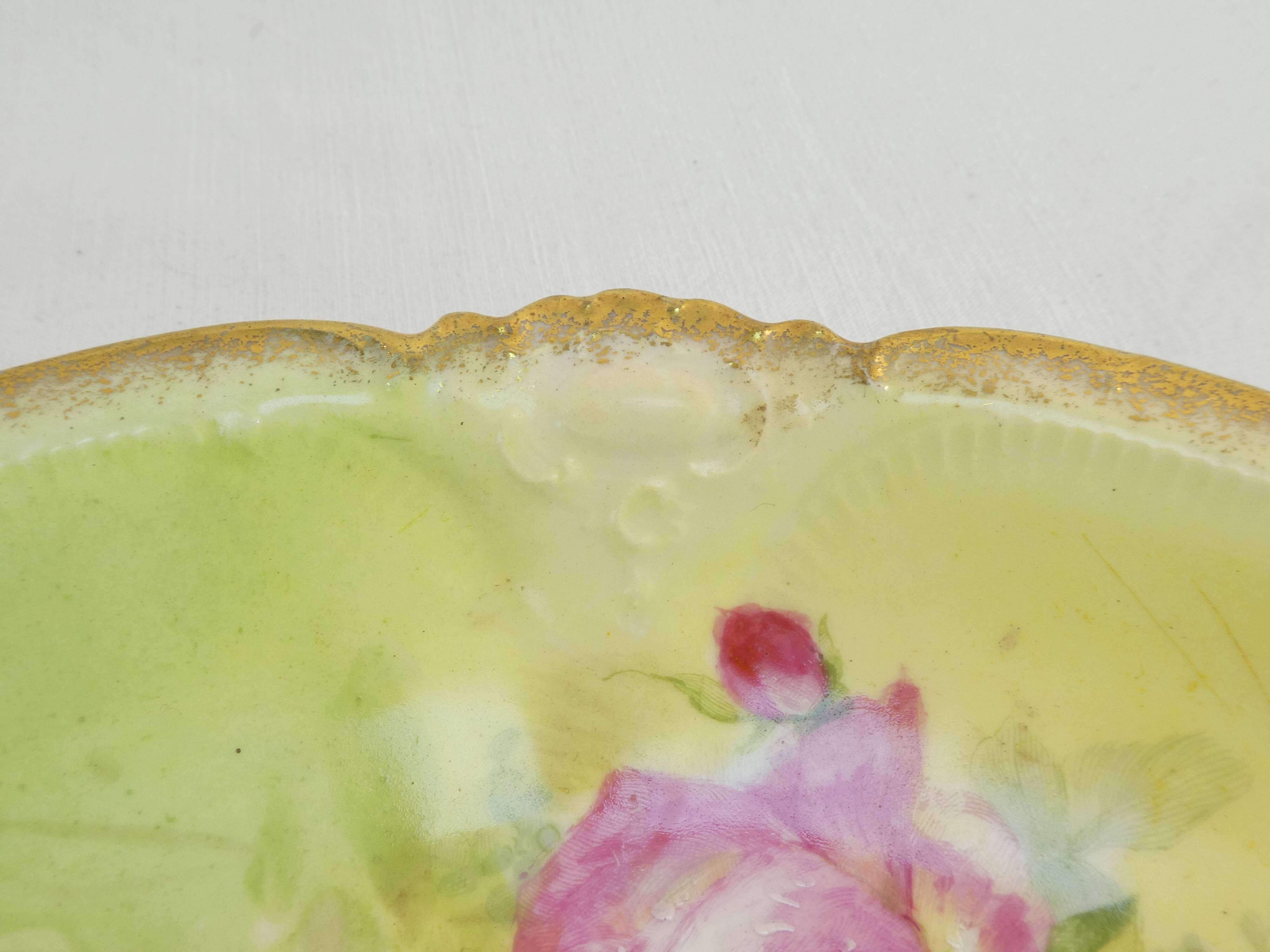 Pair of limoges porcelain plate ''Mandavy de mavaleix'' rose decoration