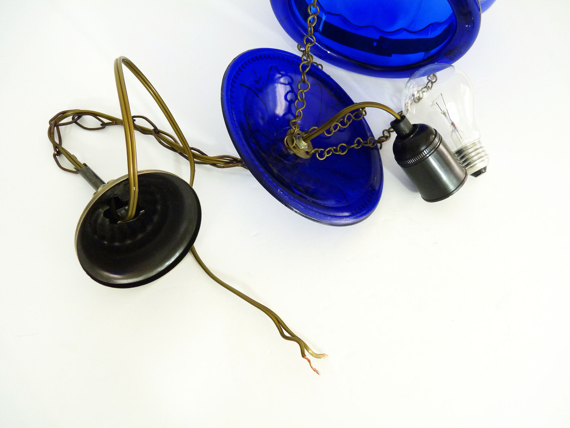 Suspension chandelier, oriental blue glass lantern and brass structure. Year 70-80