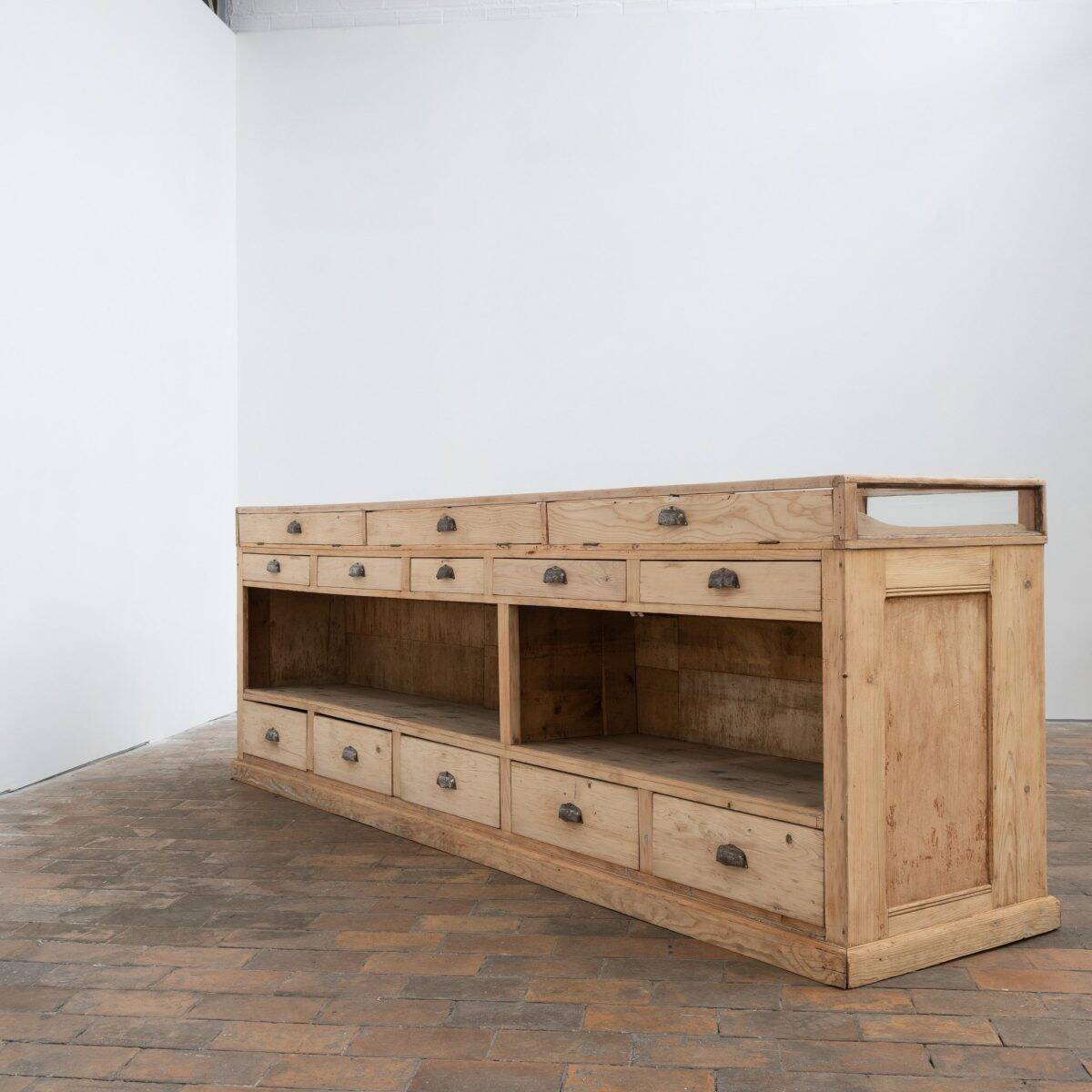 Old glass-fronted pine trade counter - early 20th century