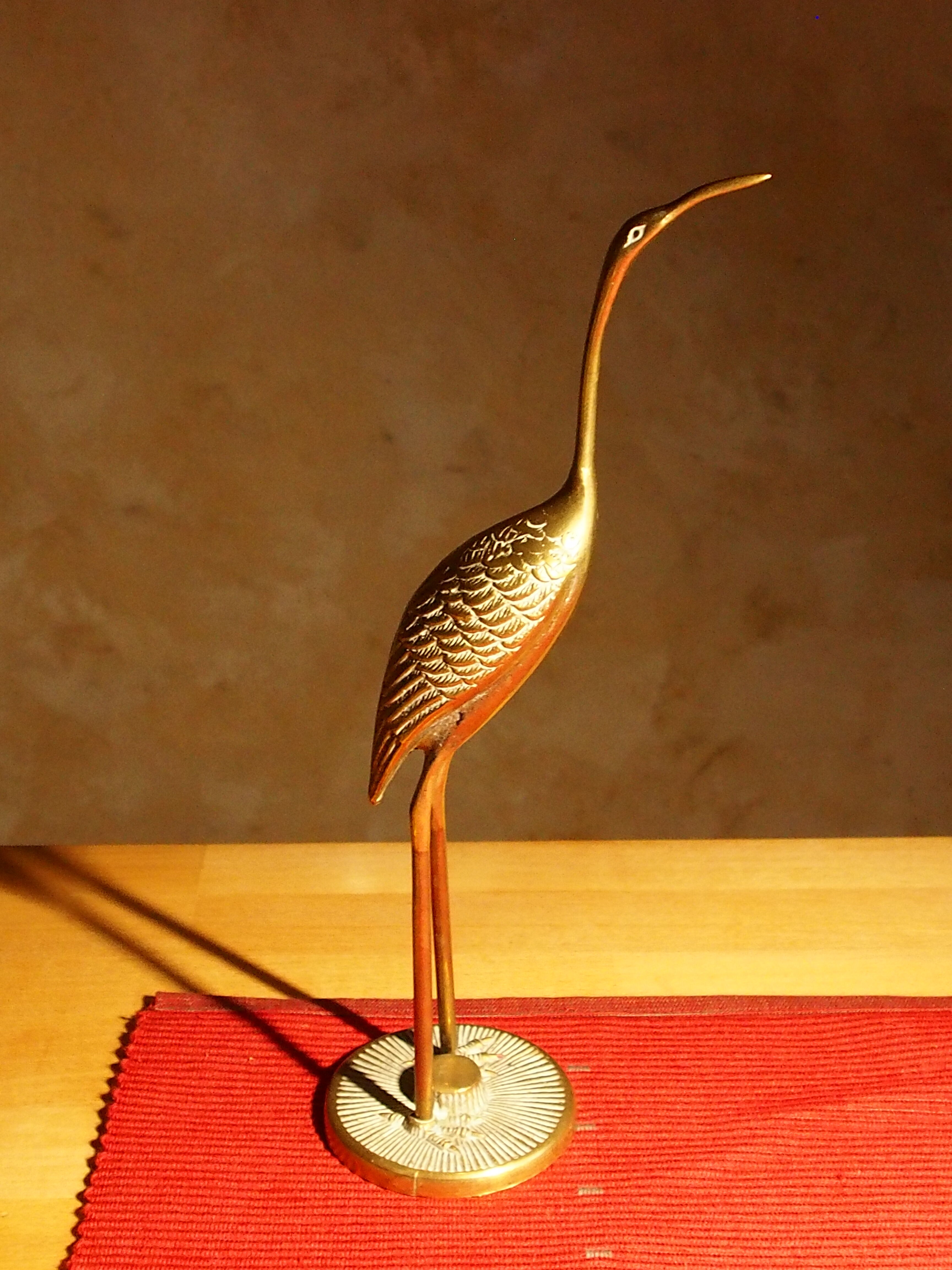 Vintage brass heron