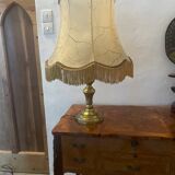Brass and pig bladder lamp
