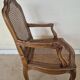 Fauteuil style Régence en bois et cannage