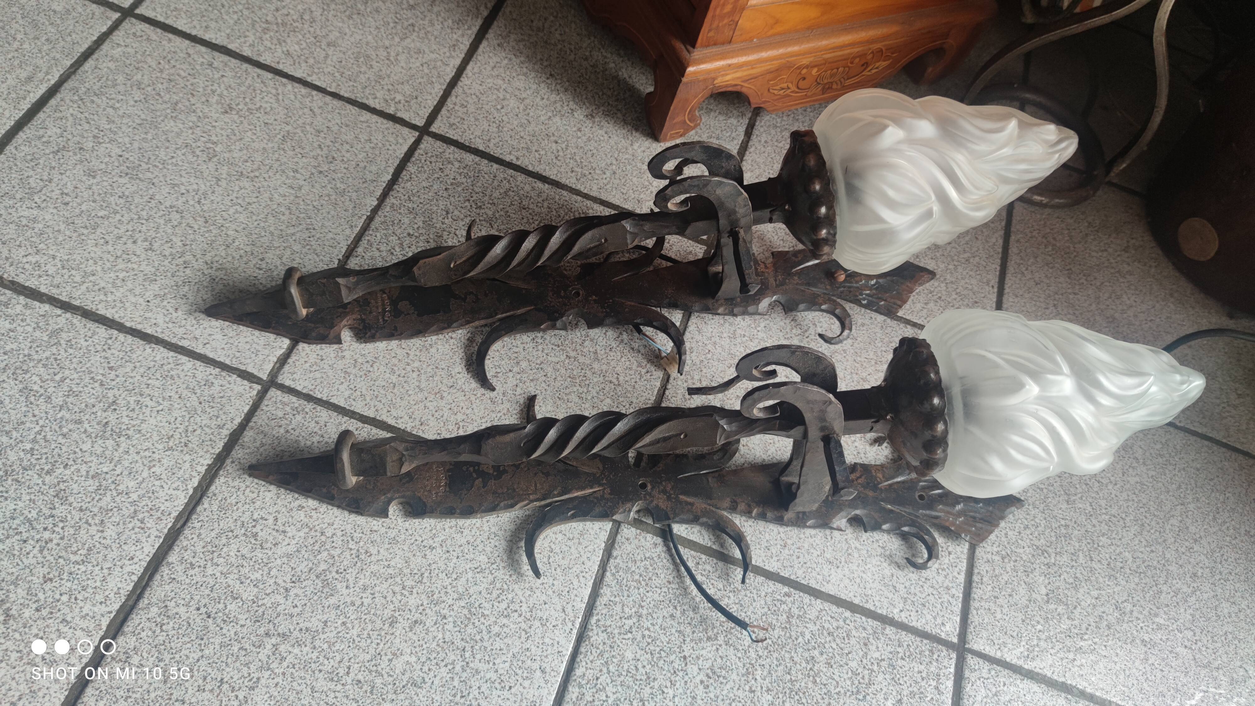 Pair of steel and glass torchieres circa 1950