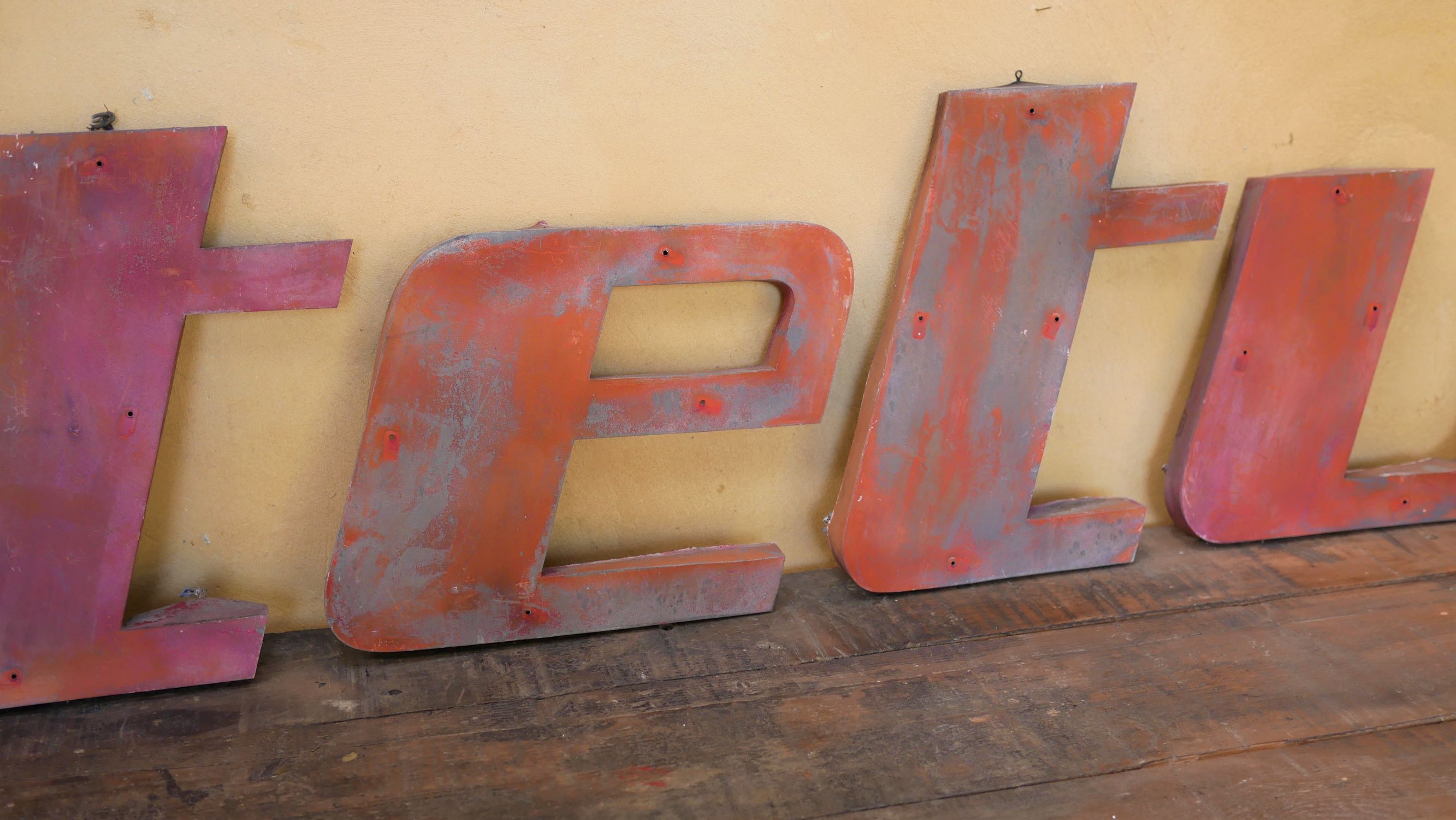Letter to sign vintage metal "T".