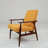 Vintage amber armchair Hermes designed by H. Lis