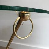 Round coffee table of neoclassical style in brass