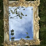 19th century style beveled mirror with garlands of flowers and leaves