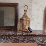 Vintage bird cage in rattan