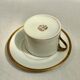 Teacup with its white Limoges saucer and fine-sized porcelain gold:H-6.5 D -17