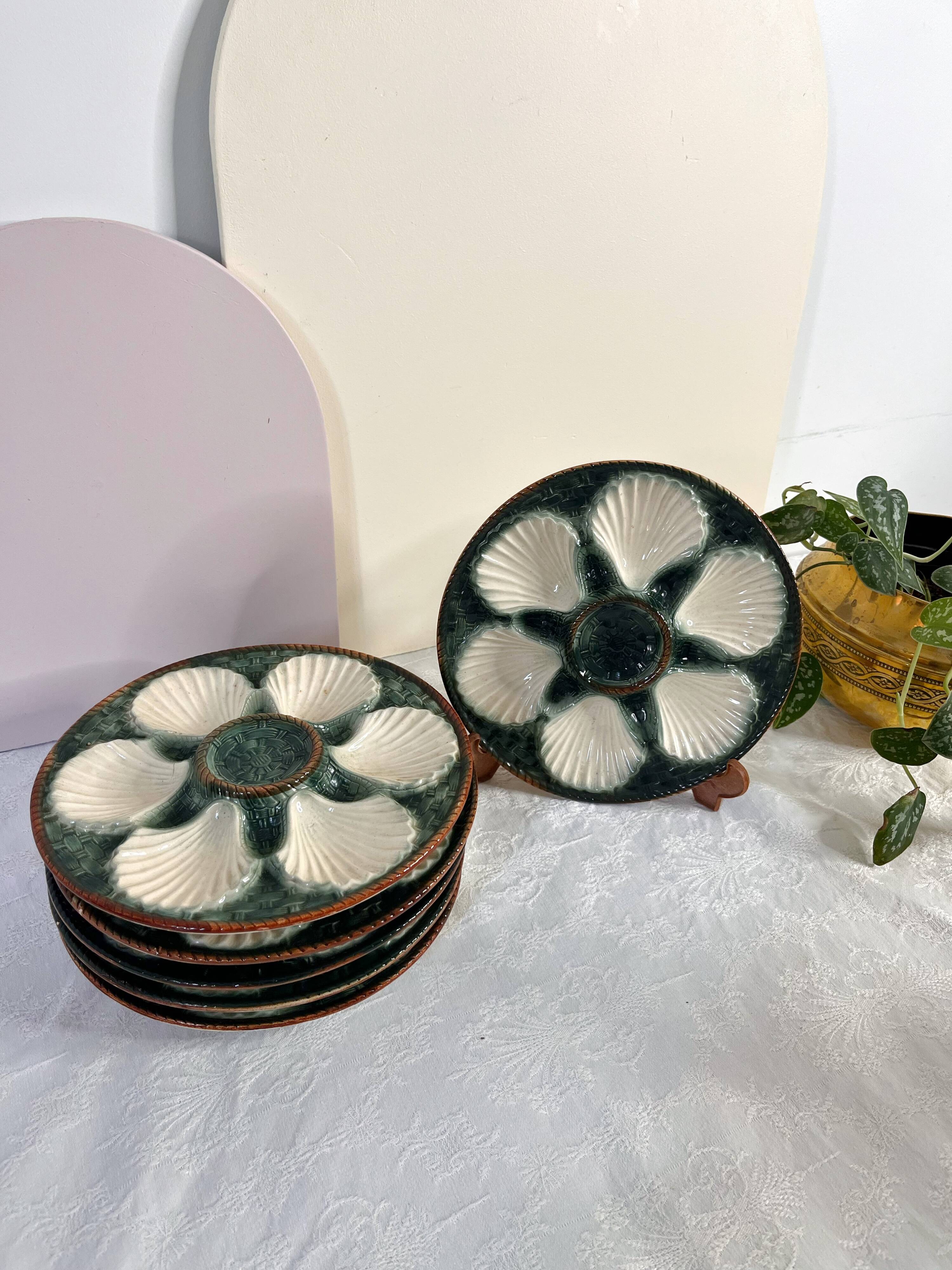 Green and white slip oyster plates
