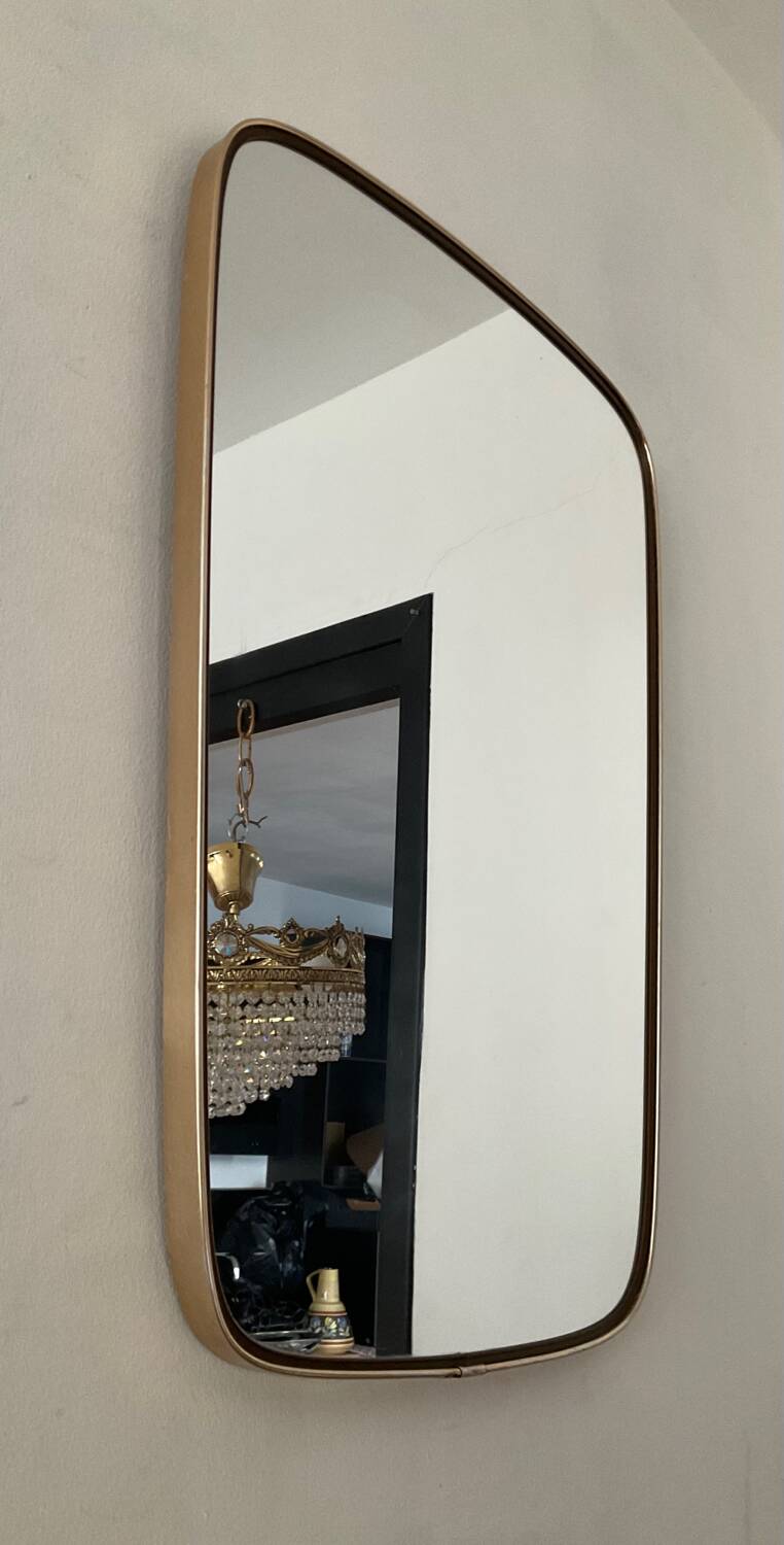 Asymmetrical free-form mirror from the 60s-70s