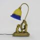 Vintage bronze table lamp featuring a painter on a mirror from the 1960s.