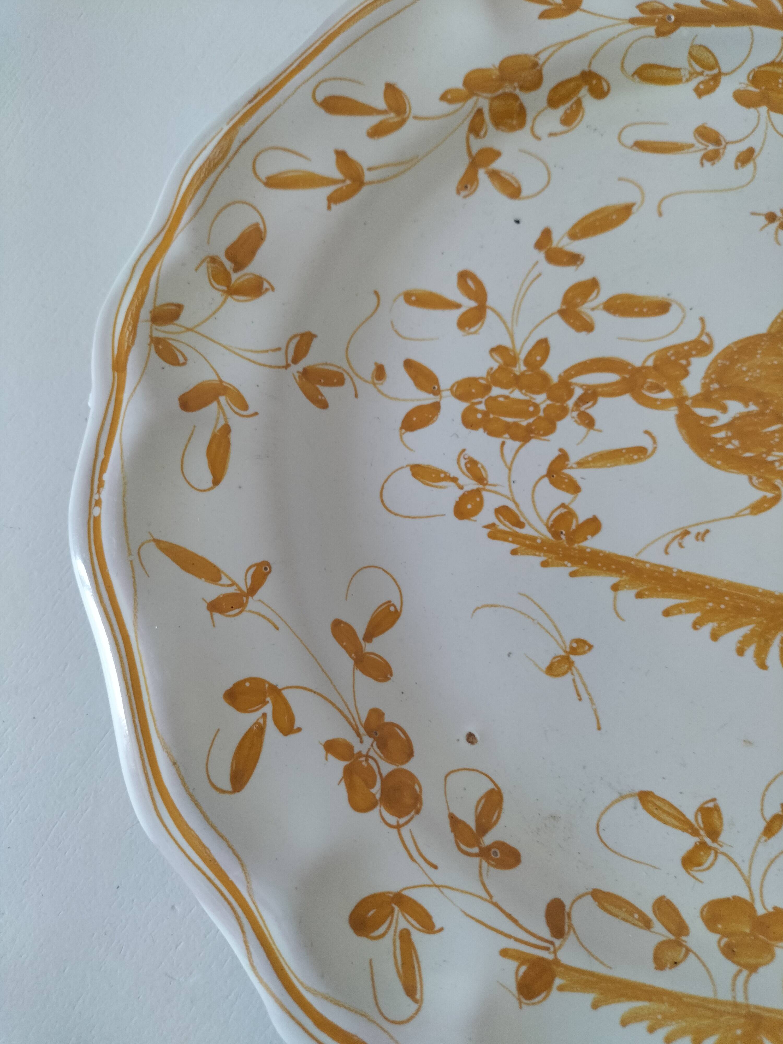 Earthenware plate from Martres-Tolosane, Moustiers decoration, hand-painted.