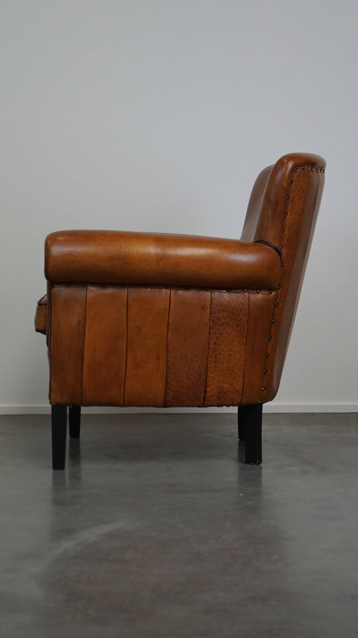 Fauteuil en cuir de mouton à l'aspect luxueux