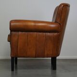 Fauteuil en cuir de mouton à l'aspect luxueux
