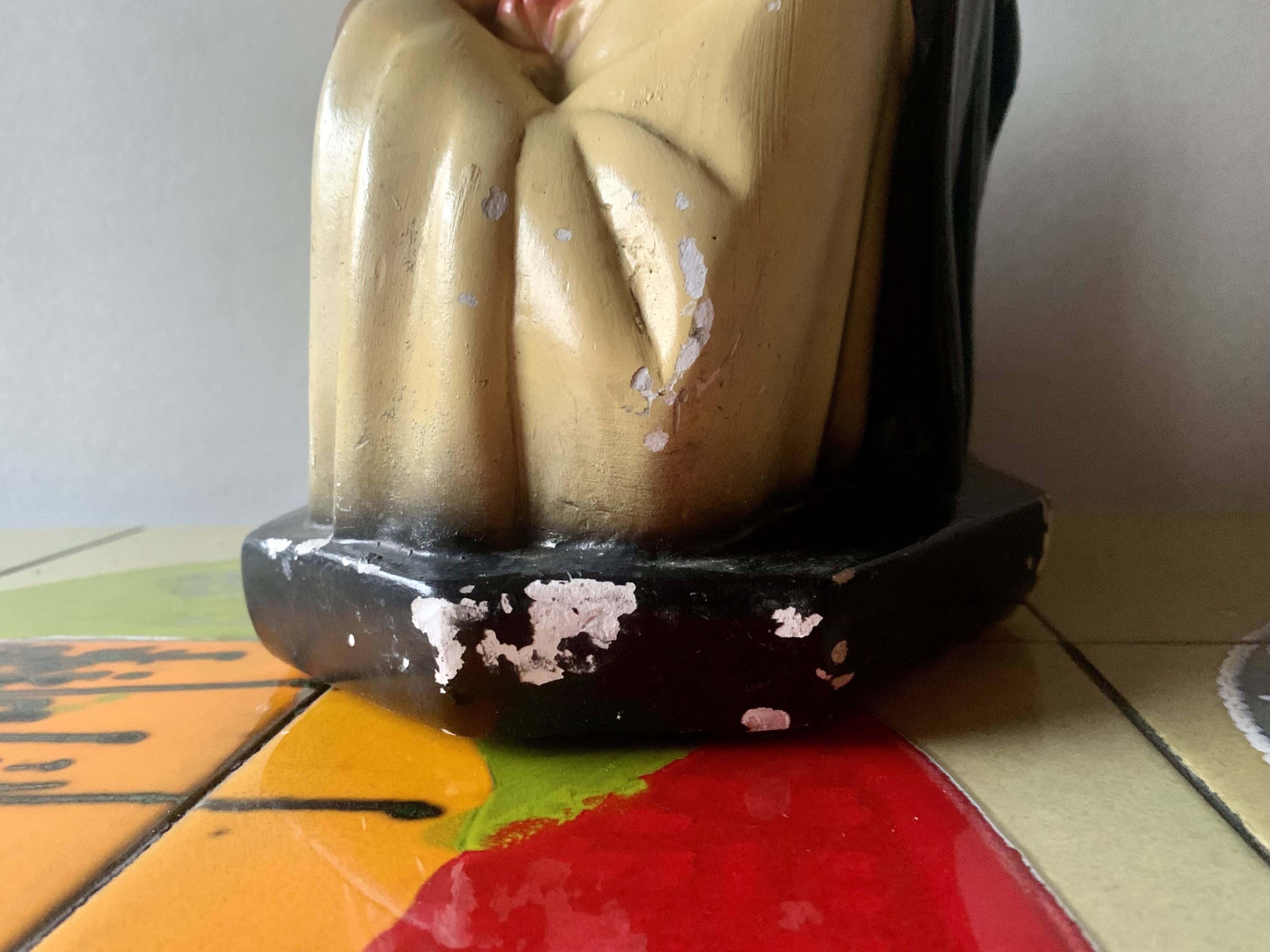 Old plaster bust of Saint Thérèse of Lisieux