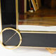 Black Murano glass mirror and brass ornaments (1980)