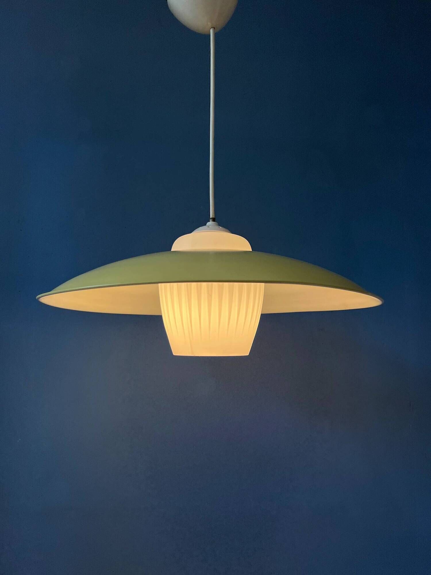 Danish mid-century suspension with opaline glass shade and yellow metal cover.