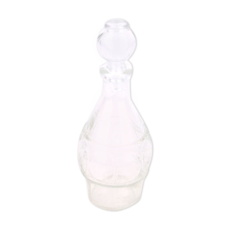 Small bottle with a glass cap with geometric patterns