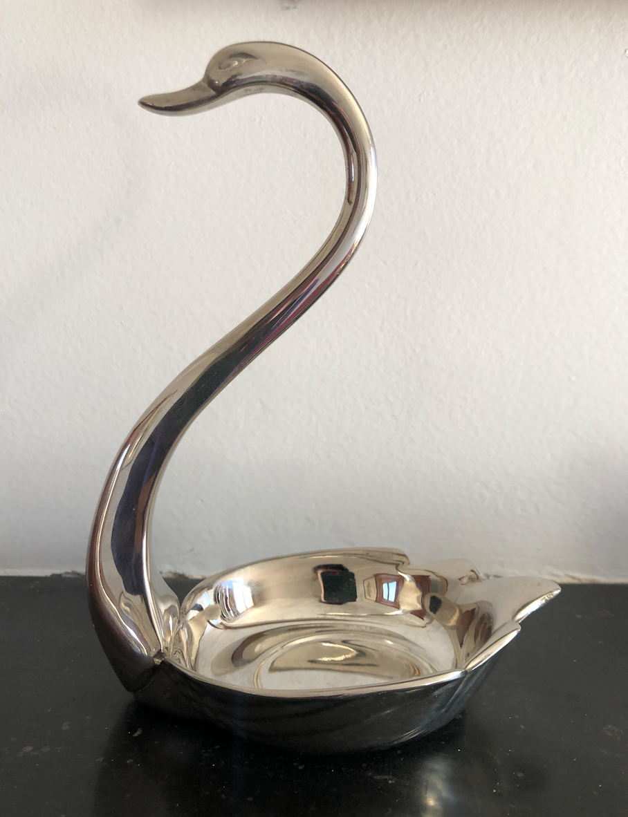 Empty silver swan pocket