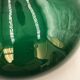 Green opaline suspension