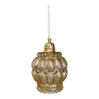 Vintage globe pendant light in amber glass