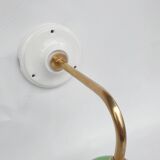 Brass collar and speckled glass wall lamp