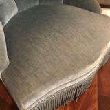 Fauteuil crapaud en velours bleu capitonné napoleon