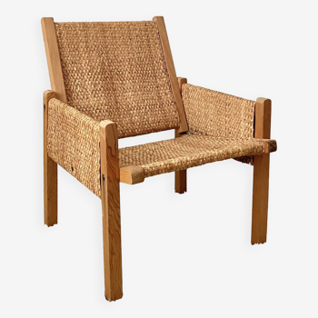 Vintage modernist straw armchair