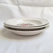 Shallow dish Gien orange and black model 456, Moulin des Loups yellow and grey.